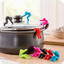 Load image into Gallery viewer, 1pc Creative Man Anti-overflow Pot Rack Silicone Multi-functional Phone Bracket Universial Home Kit Kitchen Cooking Tool Holder

